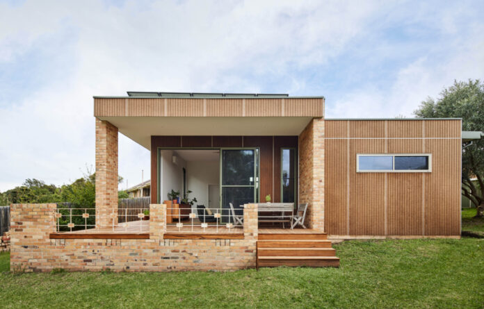 How A Clever Renovation Cut This Retro Brick Home’s Energy Bills In Half