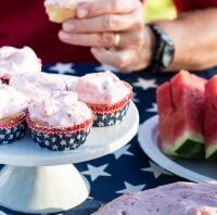 Picnic food set out on a stars and stripes tablecloth