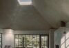 Pyramid ceiling in concrete with dining table