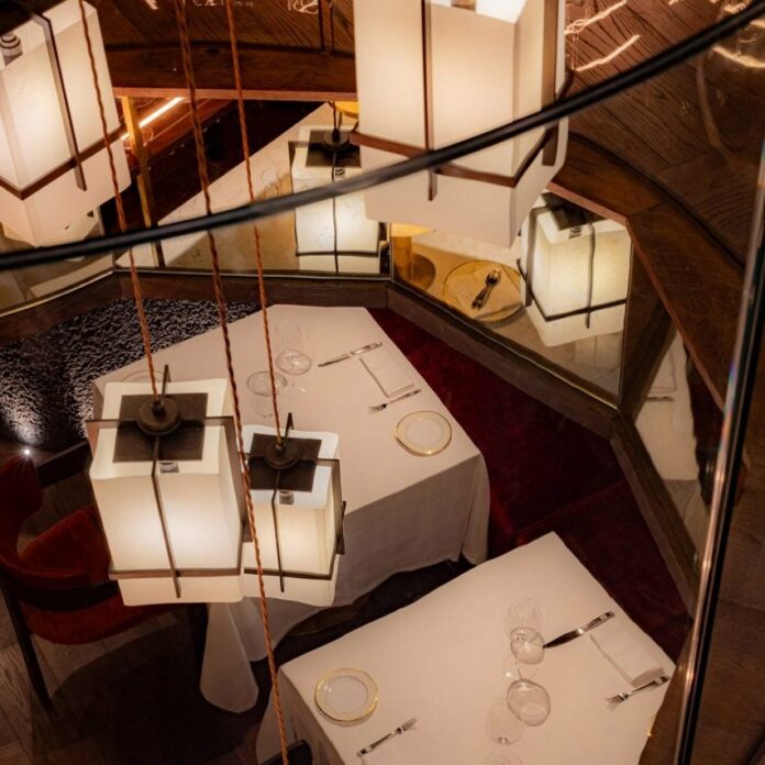 Lanterns hanging between floors of Aragawa restaurant Mayfair by Rosendale Design